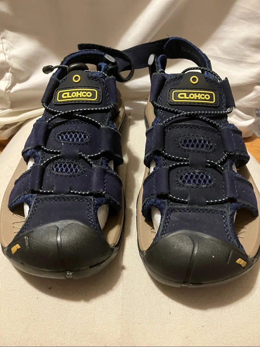 New.  Never worn CLOHCO  sz 9 men’s women’s 10 faux blue suede sandals